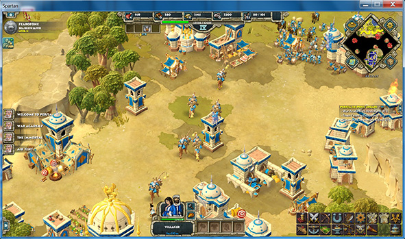 Age of Empires Online Spartan city hub with blue buildings, villagers, and interface elements visible.